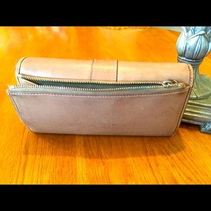 In good shape wallet with a check holder pictures